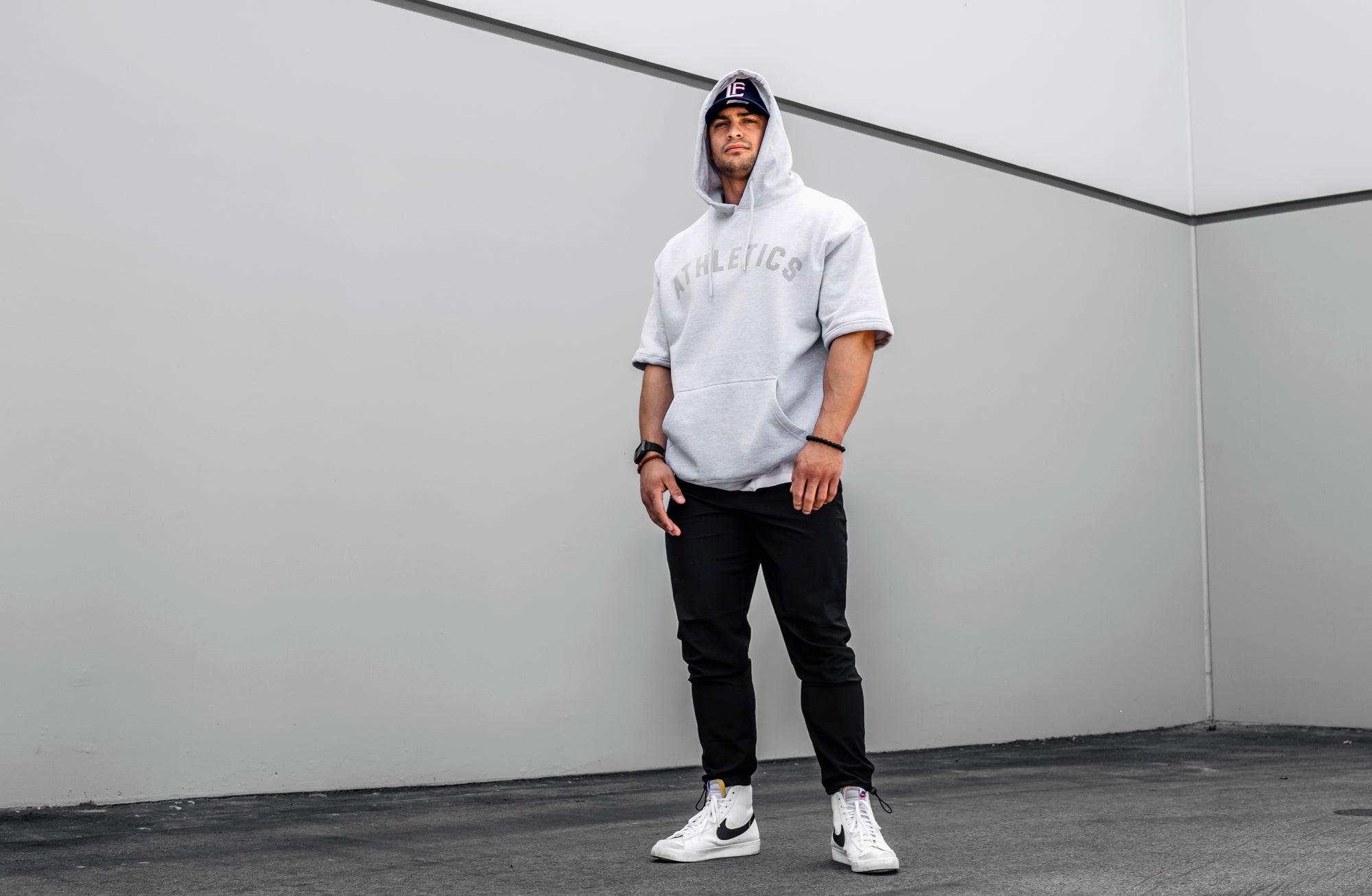 Athletics Short Sleeve Hoodie- White - Live Fit. Apparel