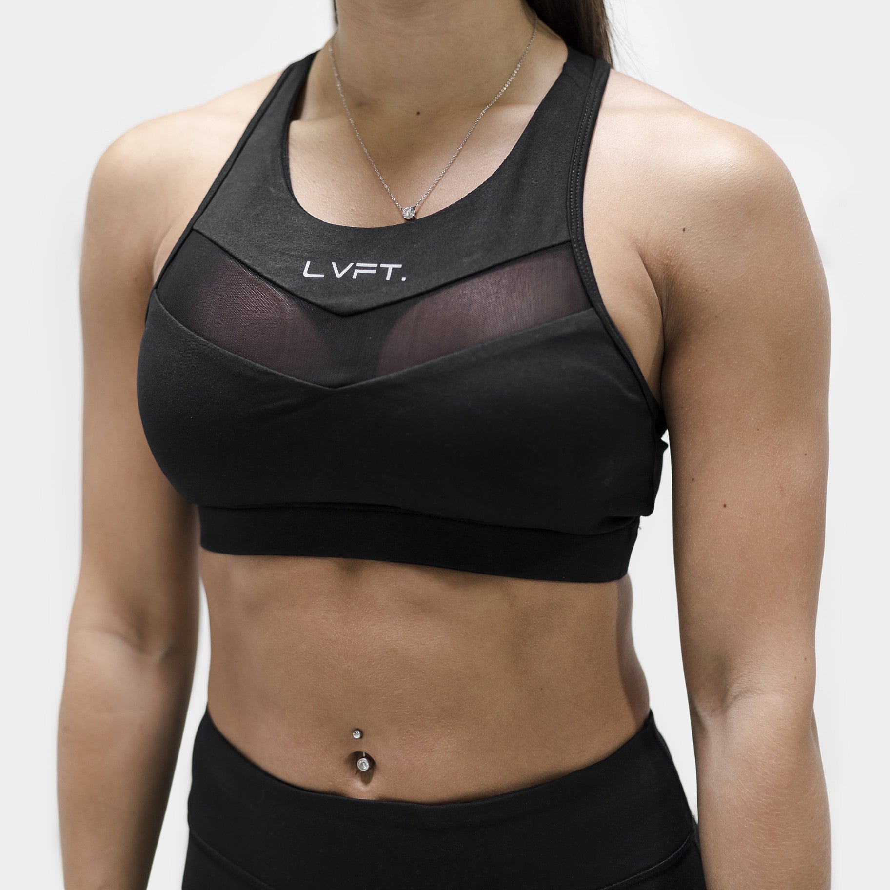 Black sports bra with mesh and padding